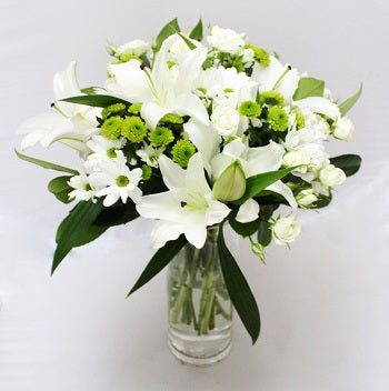 Serene White Blooms in a  vase
